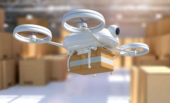A drone carries a package into a warehouse