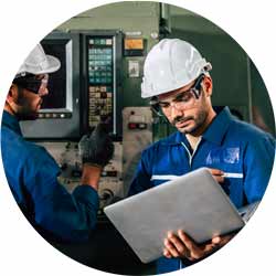 Industry engineer team worker operate control heavy machine with computer laptop to help analysis operating problem.