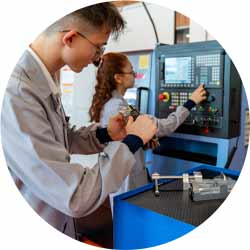 Group of Young People in Technical Vocational Training with A CNC Machine At School